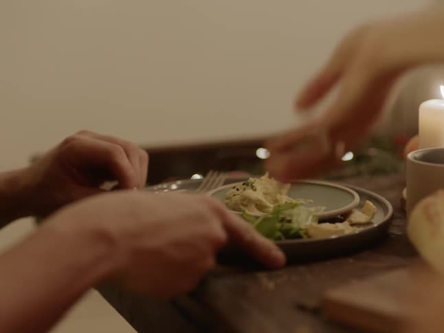 Food is served to a dinner in the restaurant
