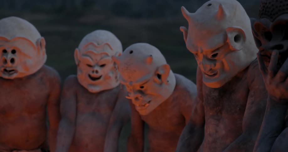People are wearing masks outside a fire