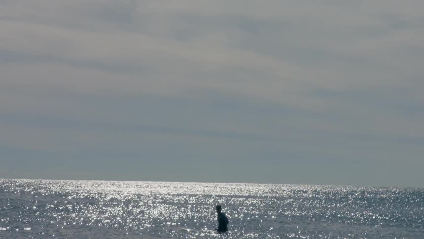 A person surfing in the ocean