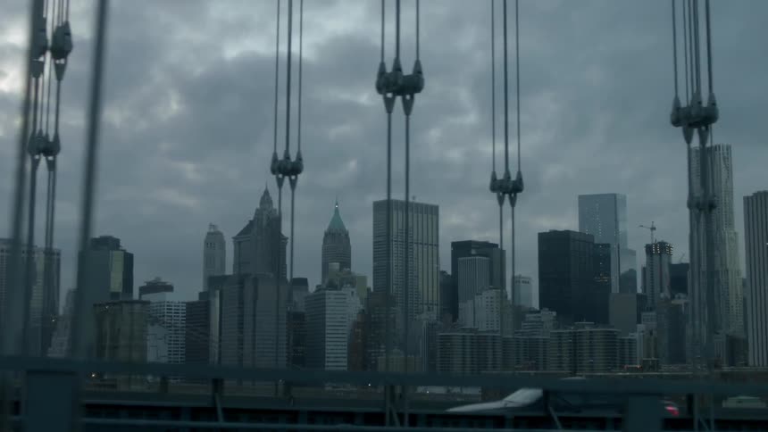 A city is shown during overcast weather