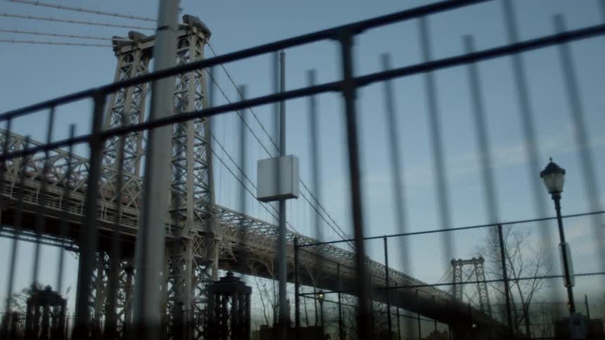 A gate is shown in front of a bridge