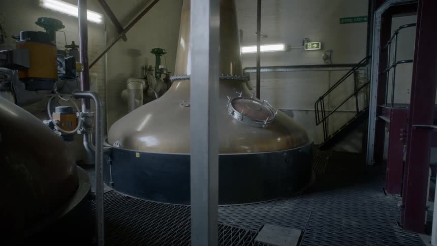 Large vat in room with other machinery
