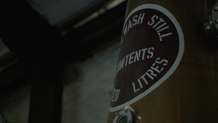 The container has a circular sign on the side