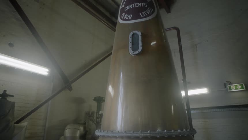 A large vat sits in a room