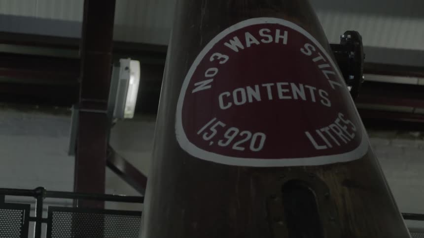 A container in the brewery has a logo on the side