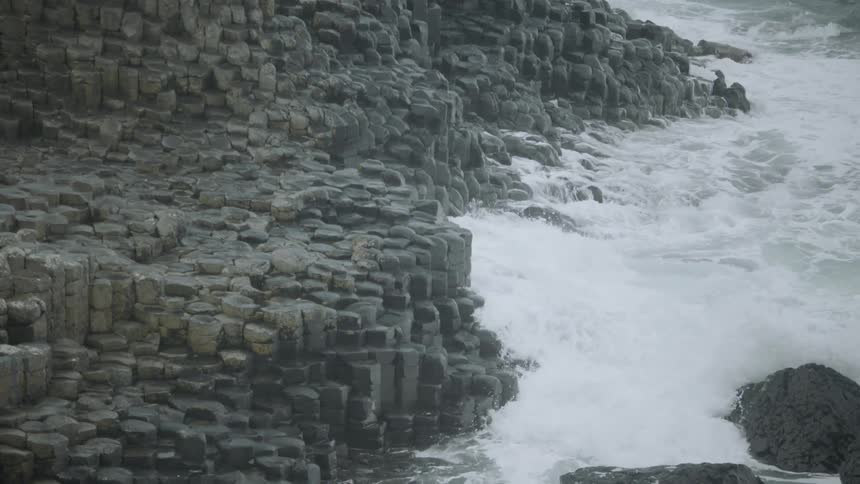 Waves crashing against a rocky coastline