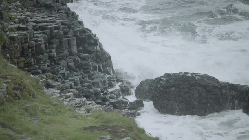 Waves crashing against a rocky coastline