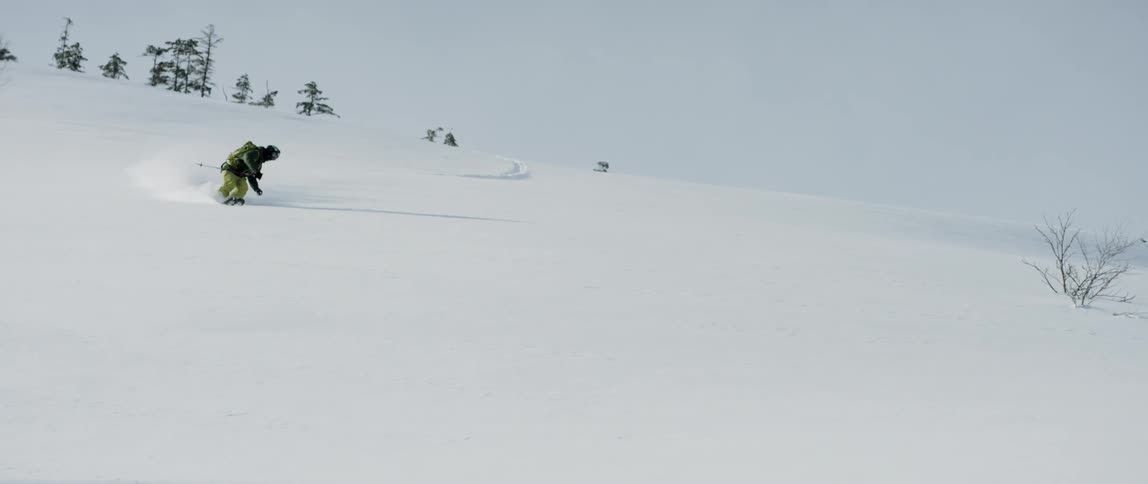 Skier slowly making their way down a hill