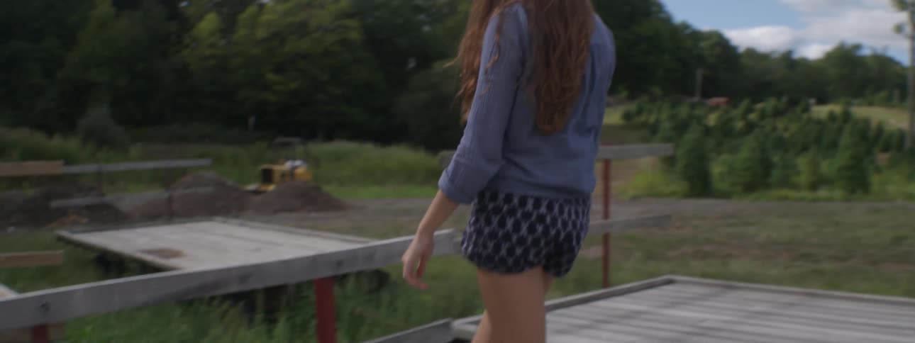A woman walking in a field