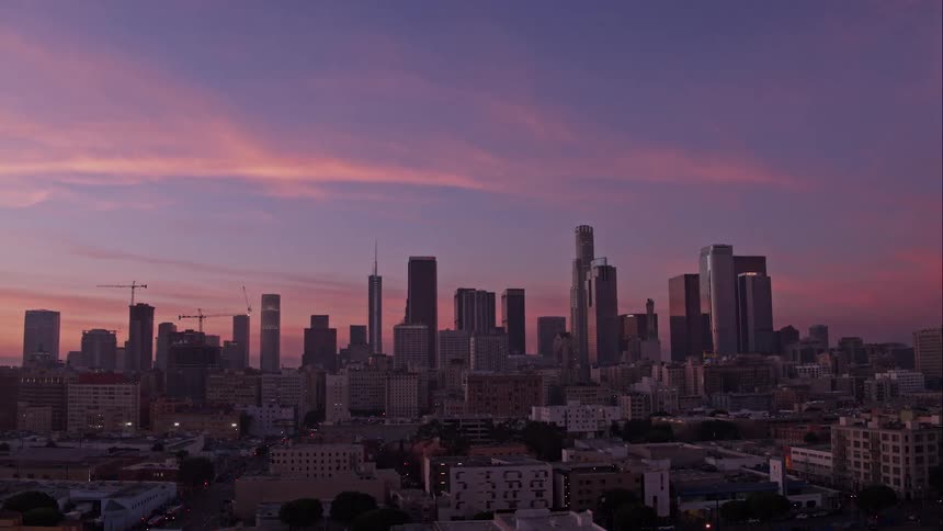 Skyline view of a city at sunset