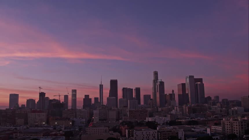 A city skyline at sunset