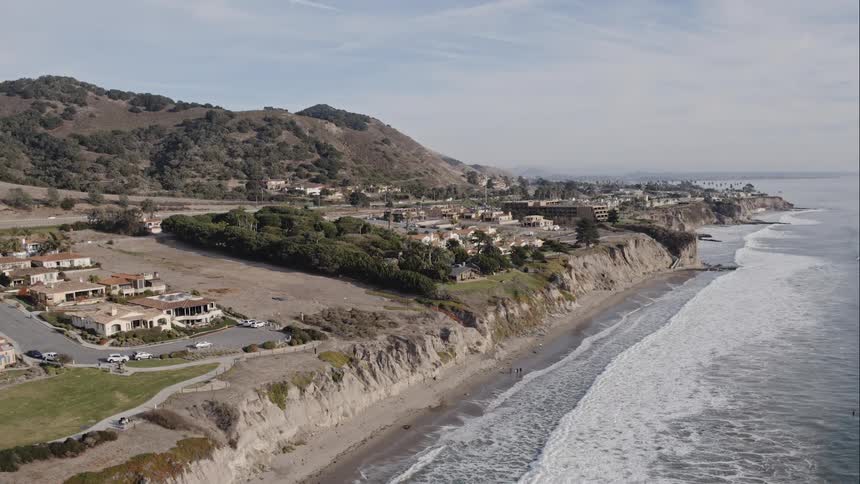 Neighborhood of homes on the coastline on an island