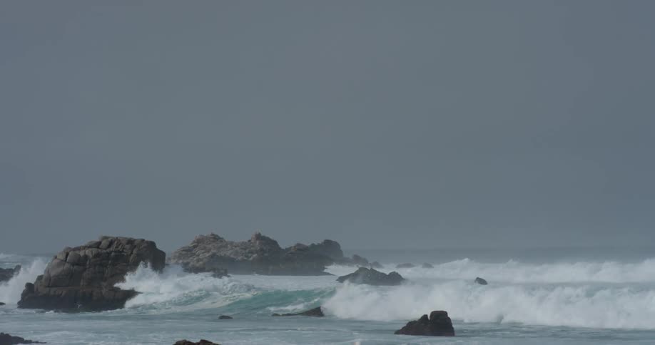 Waves crashing in to rocks