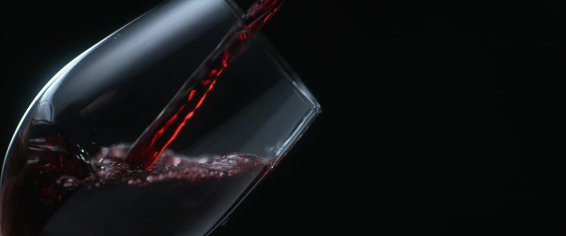Wine pouring into a glass