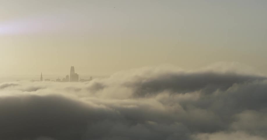 Heavy cloud cover with san francisco city skyline in background
