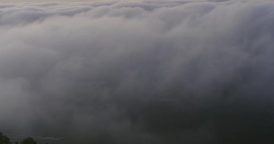 Birds eye view of clouds over the water