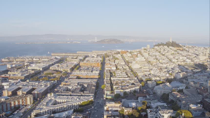 A large city near a bay during the daytime