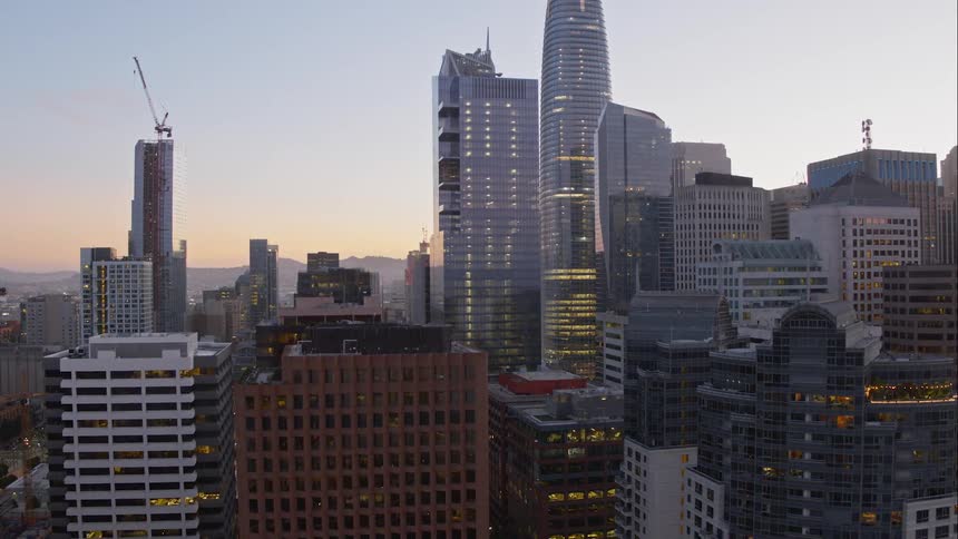 Skyscrapers loom into the sky over a city