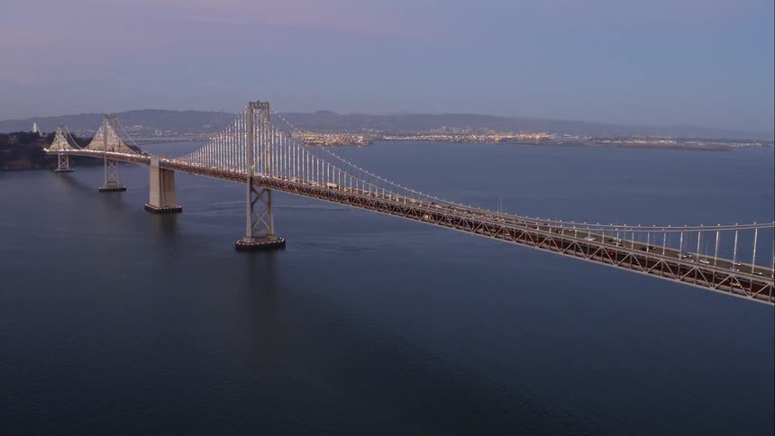 Cars driving across the golden gate bridge
