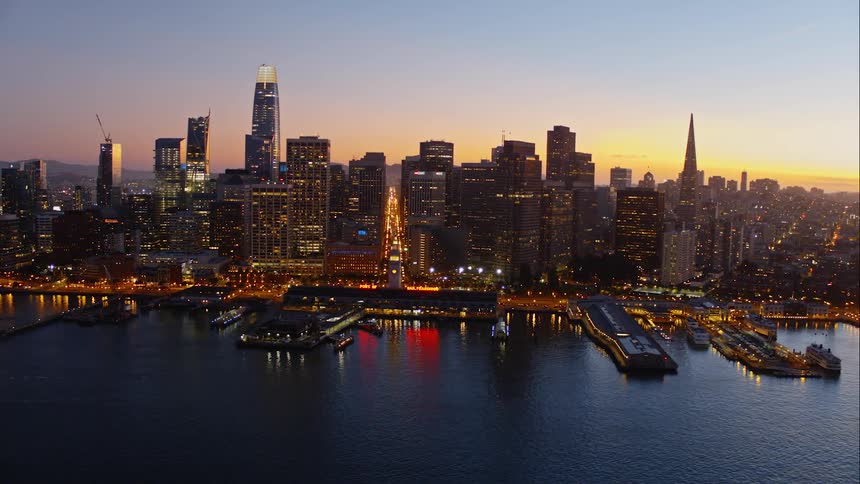 A city near the shore with buildings and skyscrapers