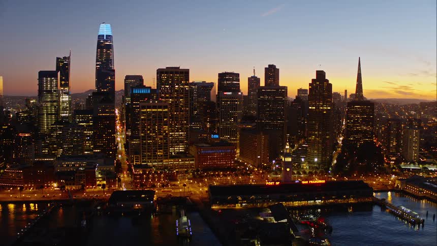 Aerial of downtown nightlife with lights shining bright
