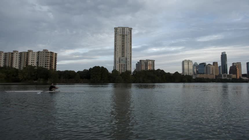 A scenery of city skyline from a river