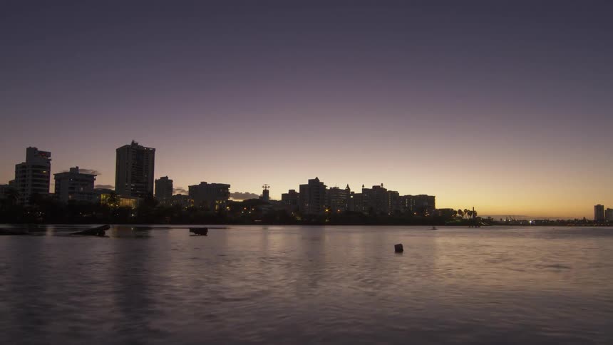 Time lapse video of city from lake