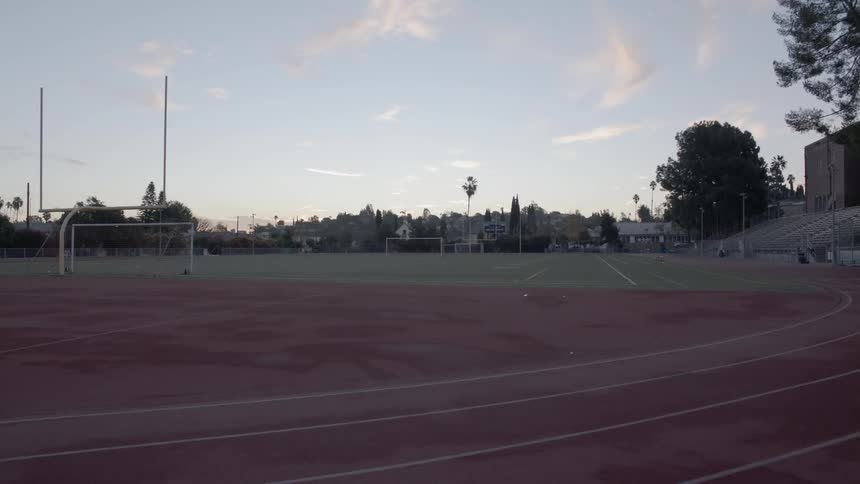 A man runs the track