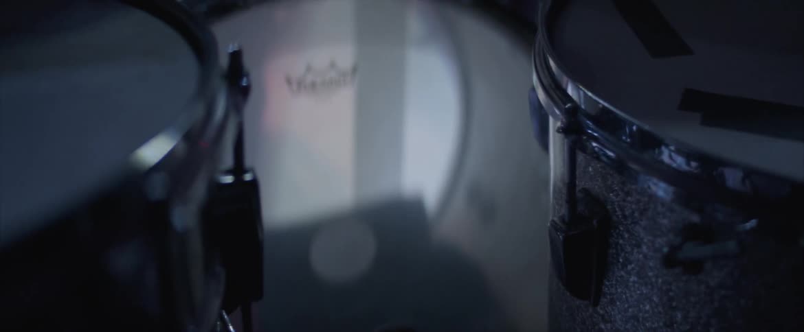 A bass drum and two tomtom drums