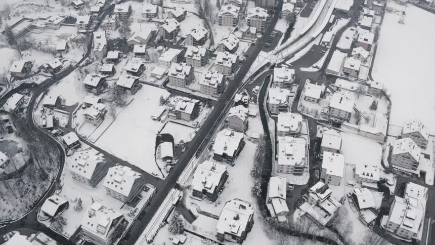 An aerial view of snow covering the city