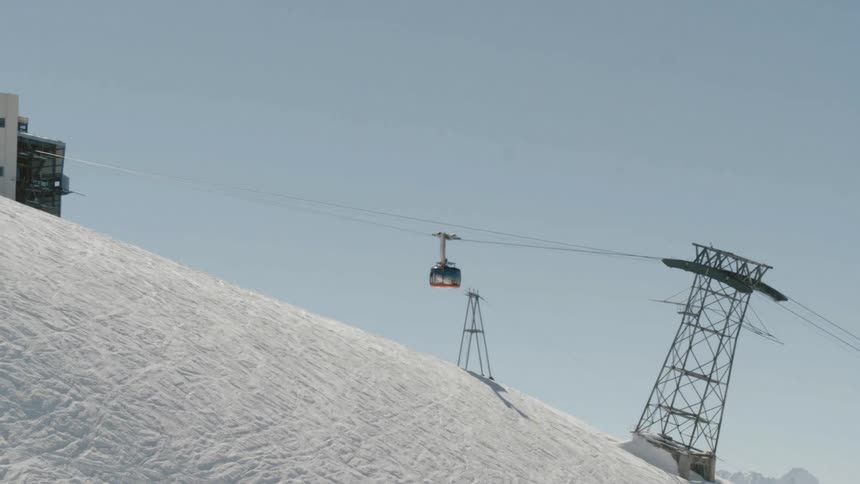 Gondola gliding up the mountain at a resort