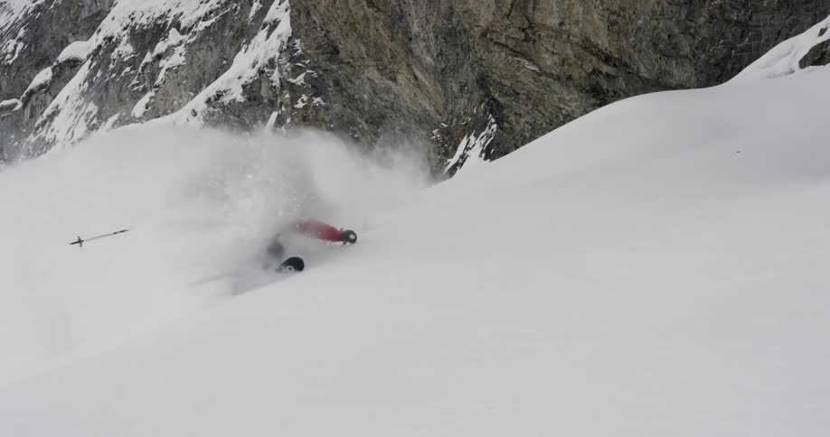 A skier twists and turns in the snow