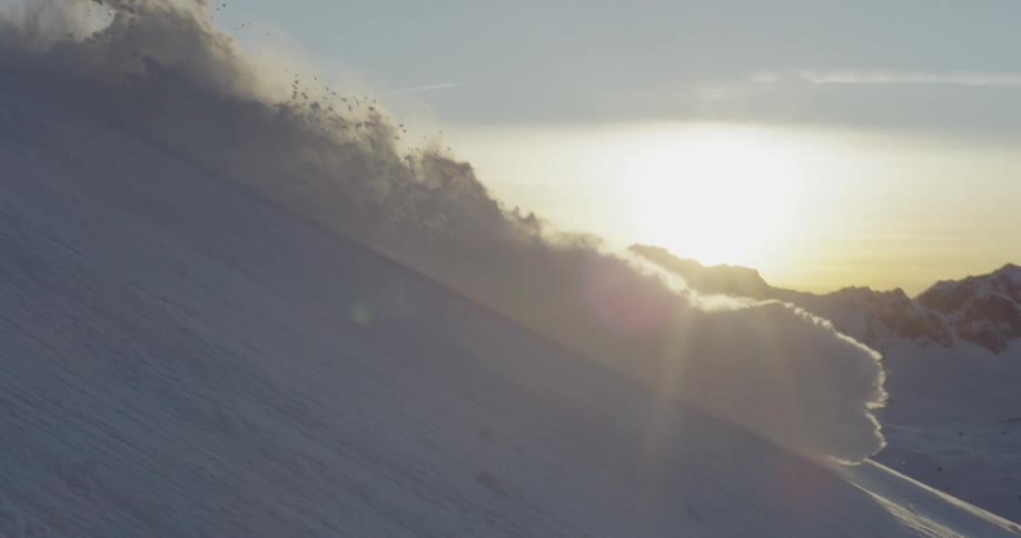 A skier zips down a mountain slope