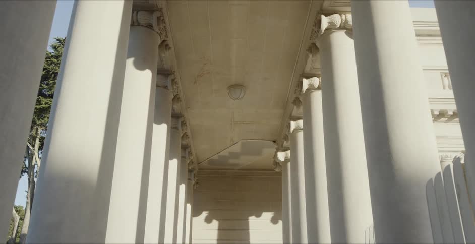 Stone pillars hold up a lofty stone ceiling