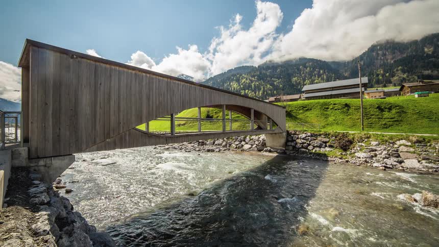 A timelapse of a bridge over a river