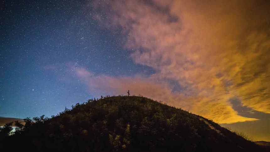 Clouds form in the night sky