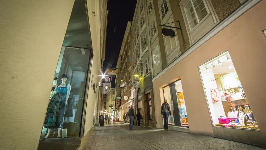 People walking along a shopping area
