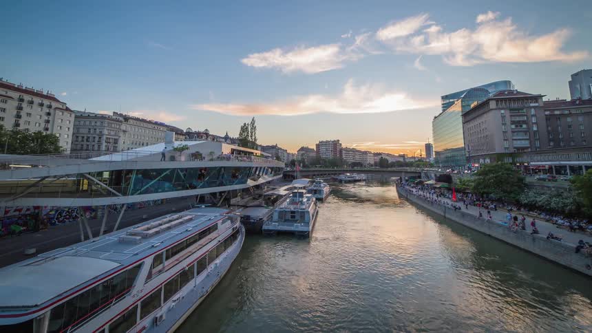 Riverfront traffic near low rise buildings