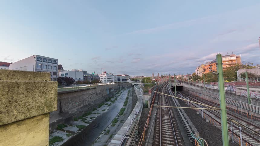 Timelapse of a rail tracks in the middle of a city