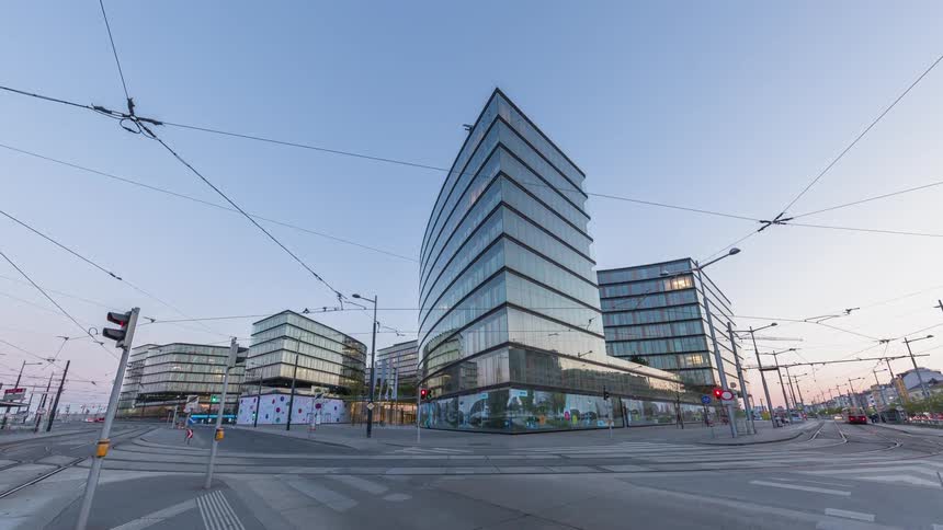 Time lapse of a tram station by an intersection