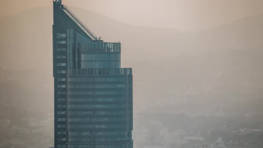A building stands tall in the horizon