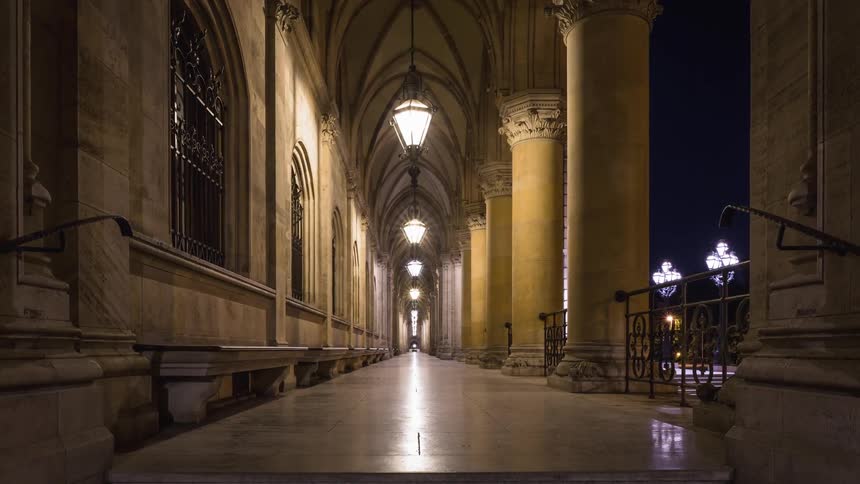 A long hallway runs the length of an old building