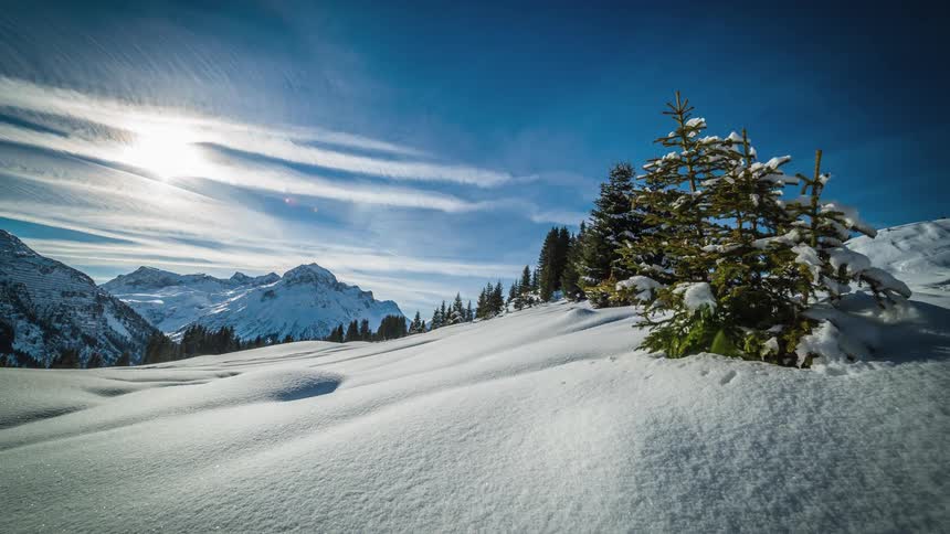 A sloping hill covered in deep snow