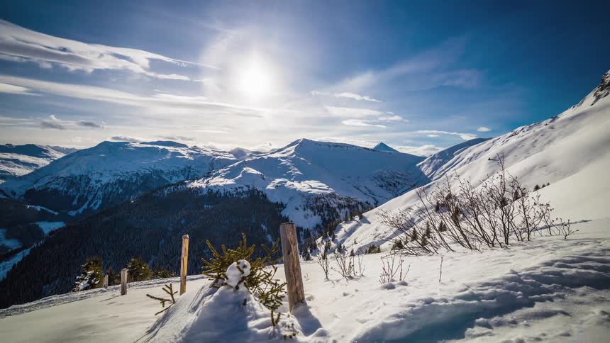 A timelapse of a snowy mountaintop