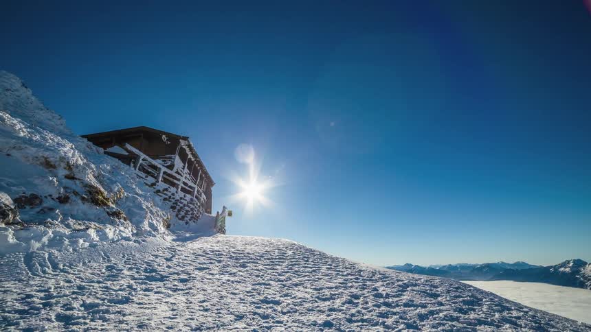 People go up and down a snow covered pathway