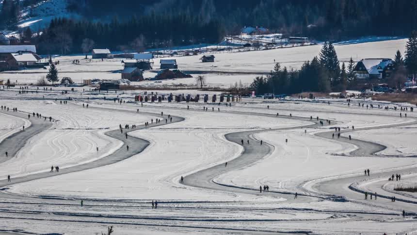 People move around a convoluted track