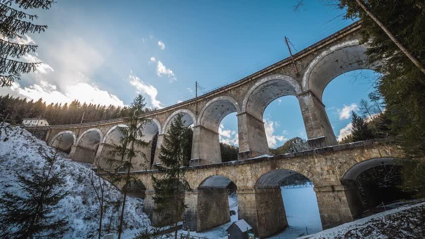 Time lapse view of a bridge in the snowy weather