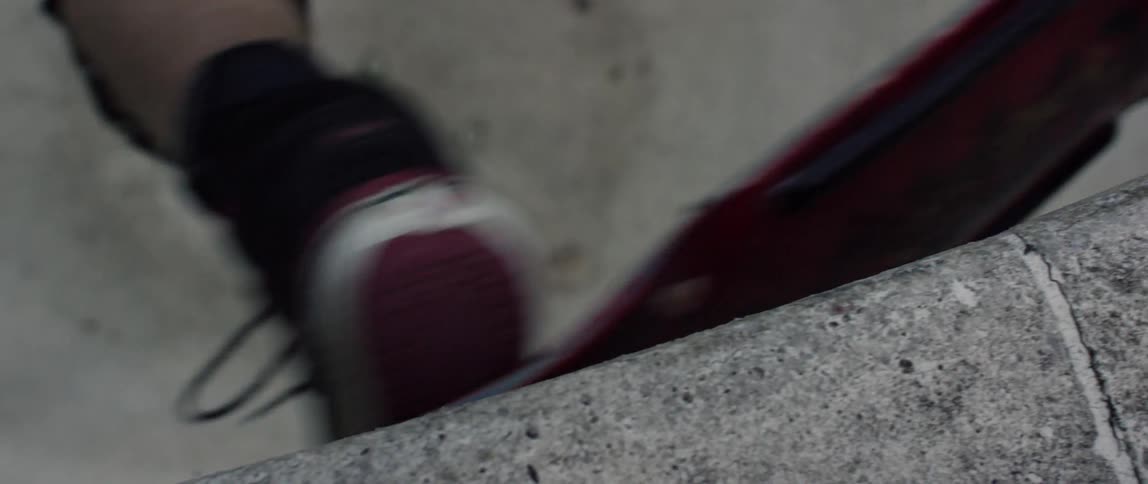 A person is skateboarding in a large dome