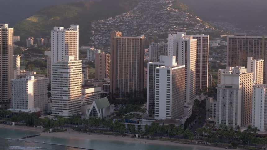 A large city sits right next to a coast line