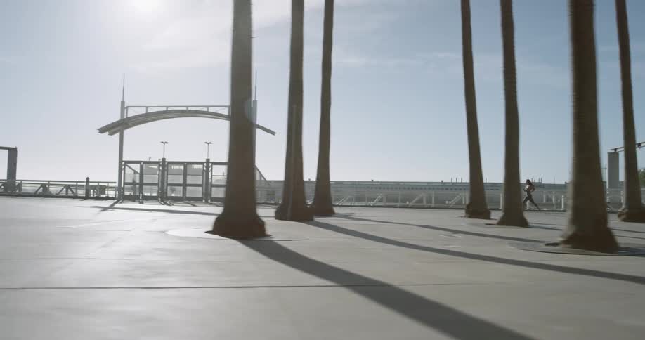 A female jogger running outdoors during the day